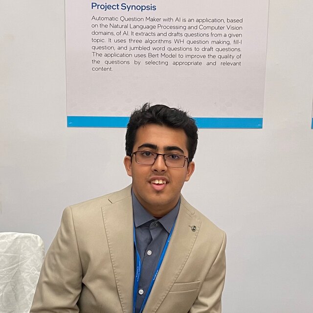 Aritra Neogi sitting in AIoT Showcase Project Booth