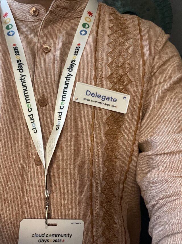 Aritra Neogi wearing Delegate badge