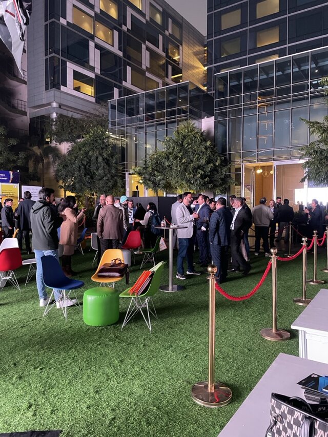 Discussions between investors and executives at evening